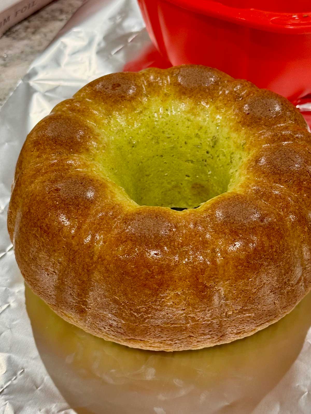 A shiny Bundt cake that just came out of a silicone pan