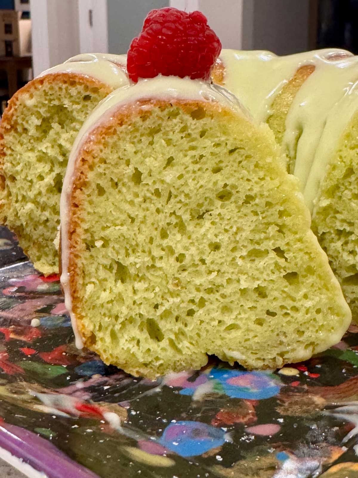 Texture of a doctored cake mix Bundt cake with Midori liqueur and cream cheese icing.