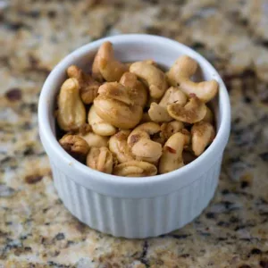 A cup of spiced cashews