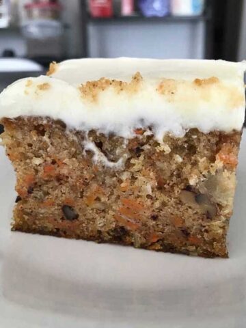 Buttermilk Glazed Carrot Cake recipe baked in a 9x13 inch pan and frosted with cream cheese frosting.