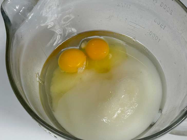 Eggs, oil and sugar in a Pampered Chef Batter Bowl