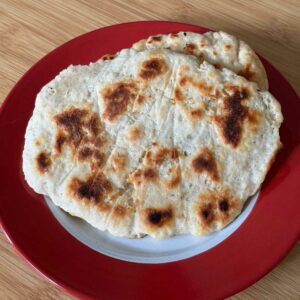 Naan 11 is a quick recipe for naan made with self-rising flour and Greek yogurt.