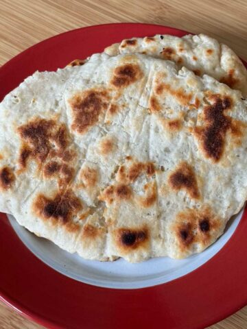 Naan 11 is a quick recipe for naan made with self-rising flour and Greek yogurt.