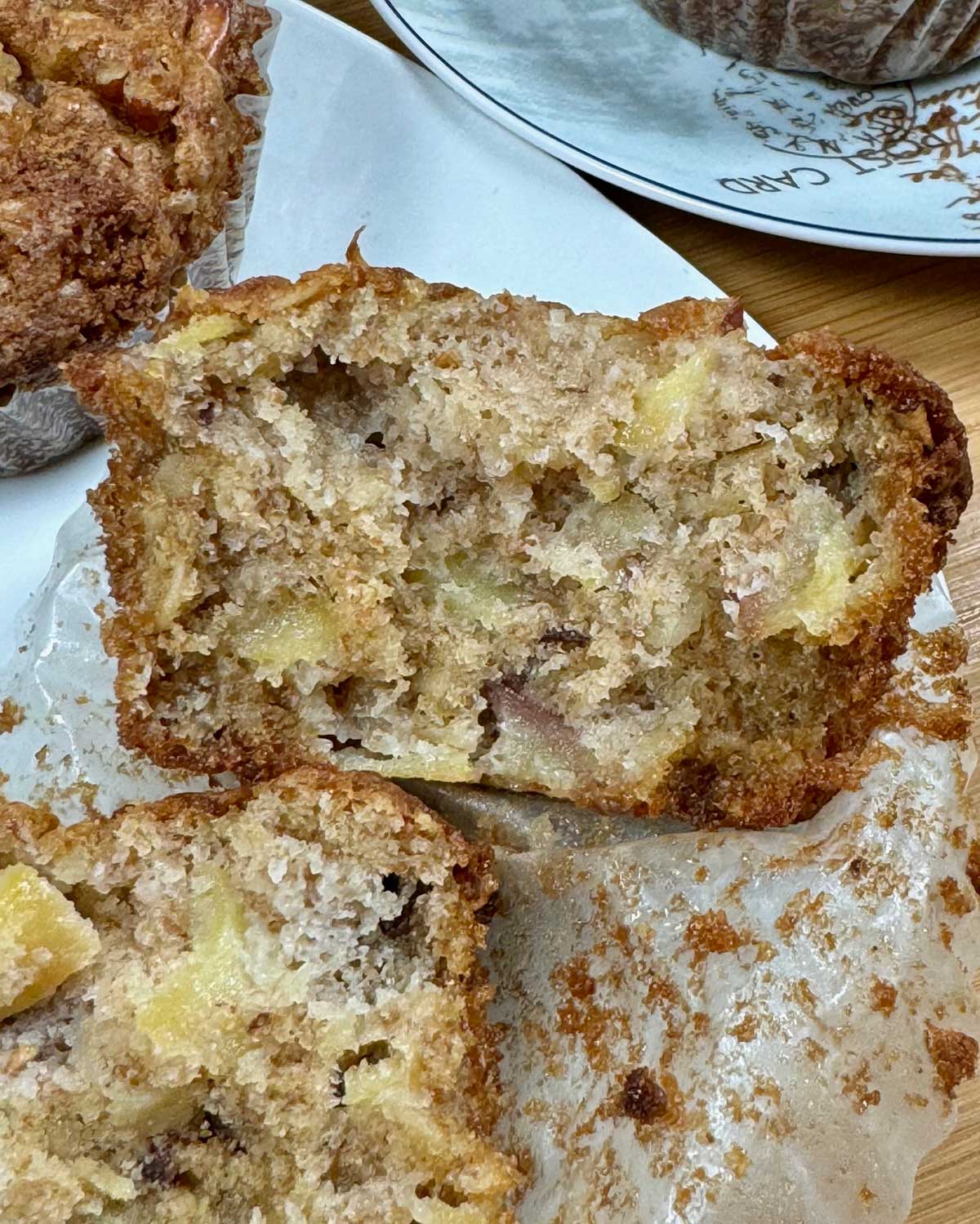 Jumbo Apple Spice Cake Muffins cut to show apple bits.