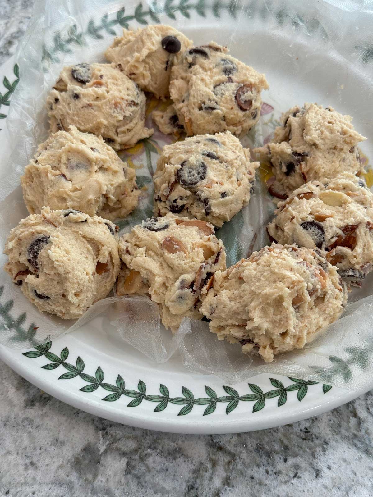 Large balls of cookie dough on a plate