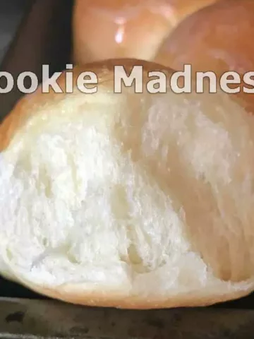 Fluffy dinner roll showing texture and the words Cookie Madness