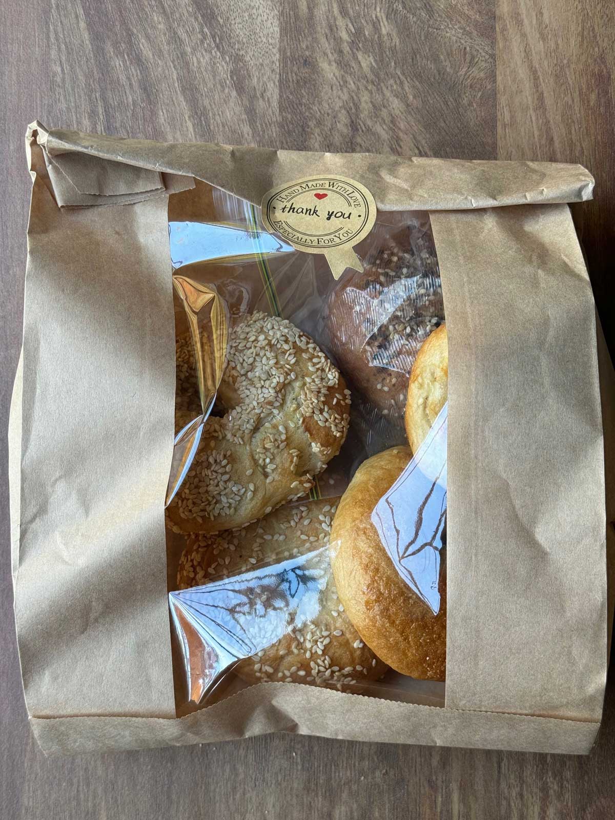 Bread bag with homemade bagels made with malted milk powder.