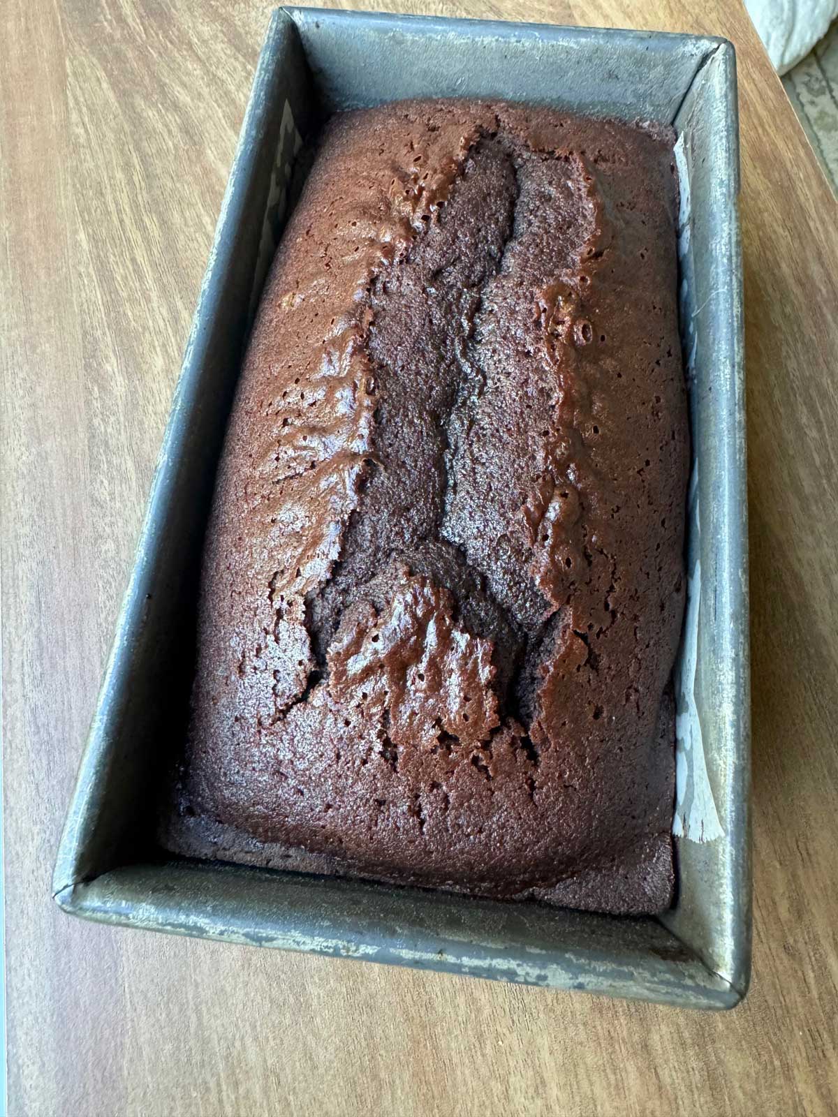 Chocolate Buttermilk Bread in an 8 ½ by 4 ½ inch metal loaf pan.