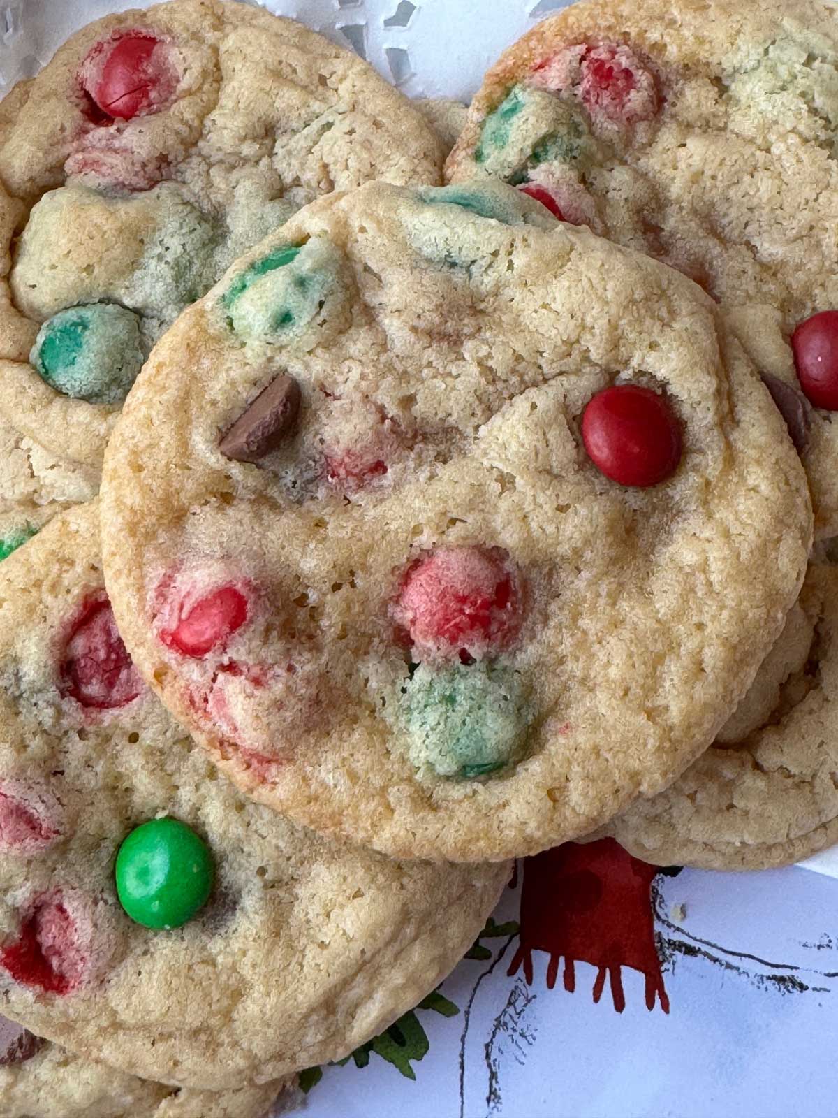 Large Batch Cake Batter M&Ms cookies that are flat, chewy and made with Christmas M&Ms.