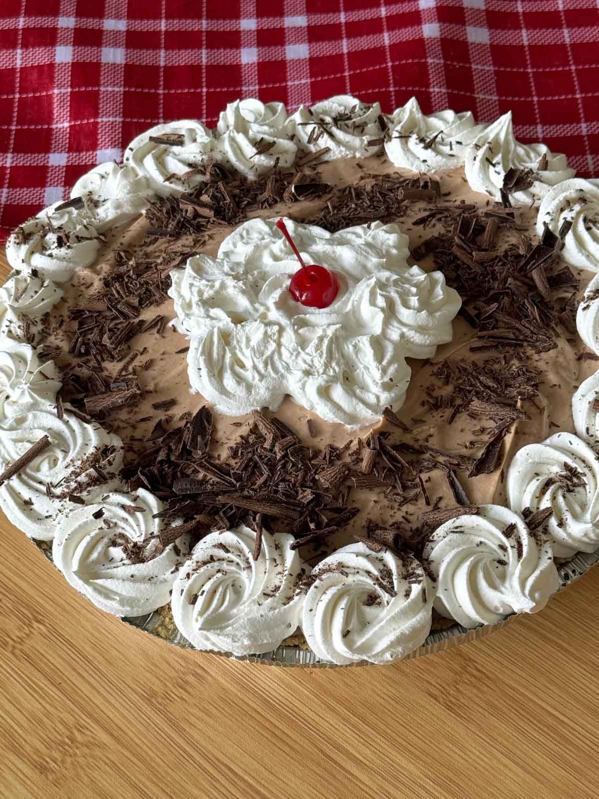 Decorated layered chocolate cream pie for New Year's Eve.