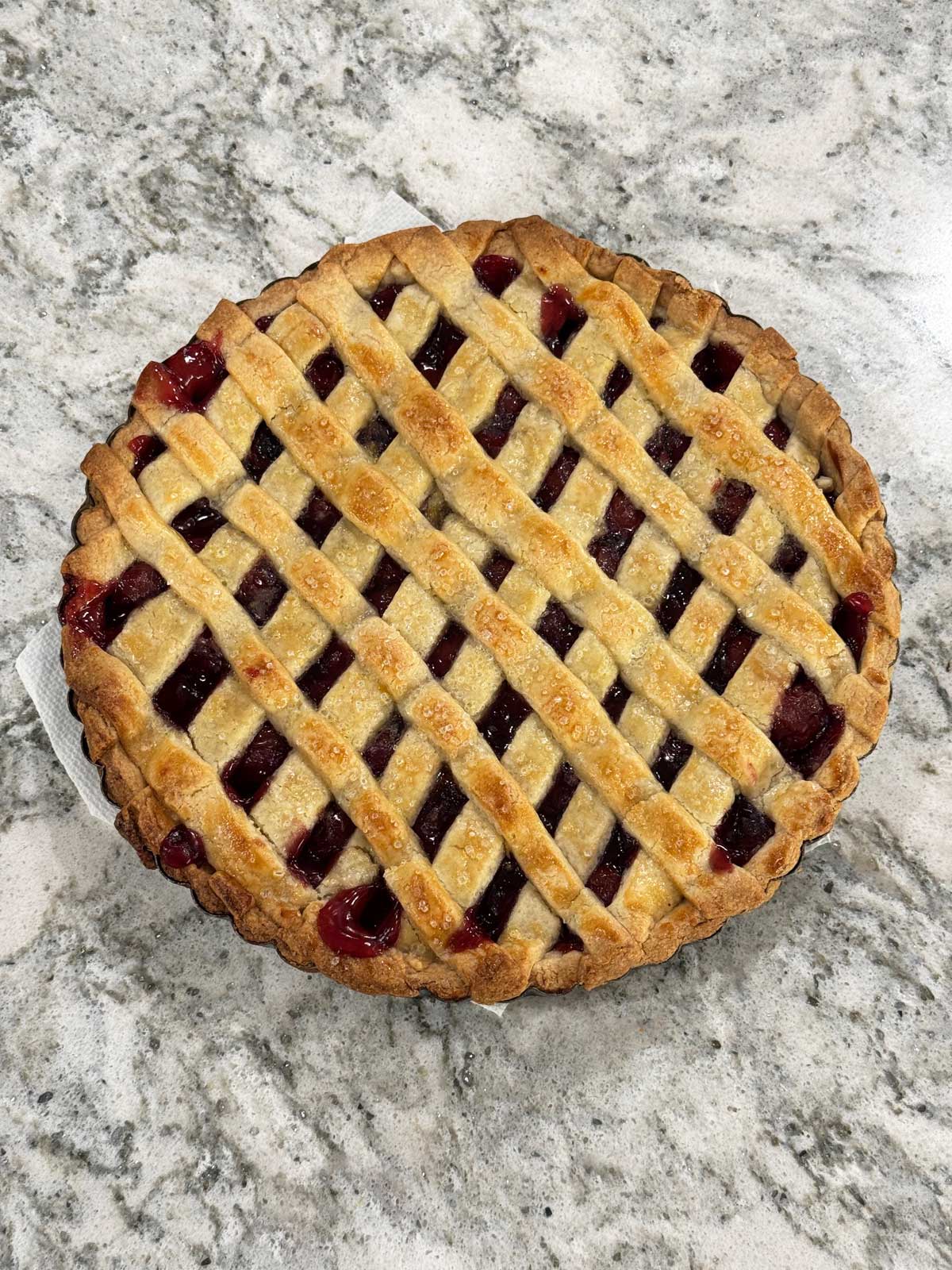 A cherry crostata made with easy pasta frolla, a dough for Italian desserts.