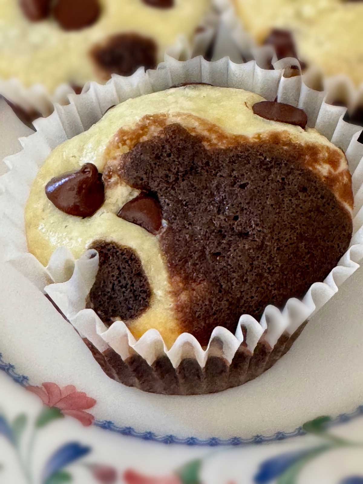 The old recipe for the ultimate black bottom cupcake with a cream cheese topping and a moisty and cakey bottom.