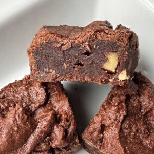 Double chocolate almond flour brownie cut to show texture.