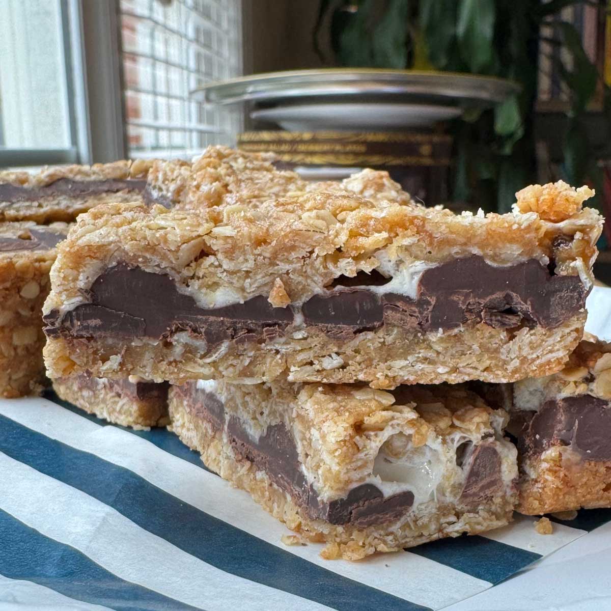 S'mores Bars baked with chocolate and marshmallows recipe.