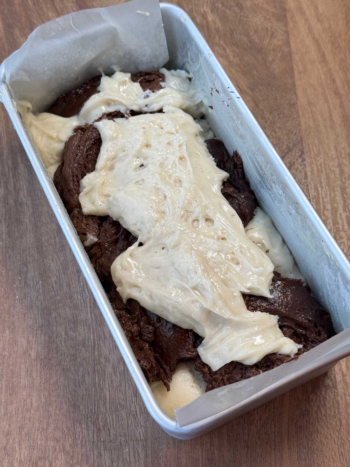 Tofu marble cake marbled in a loaf pan.