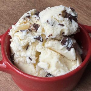 A bowl of homemade ricotta cheese ice cream with chocolate chunks recipe