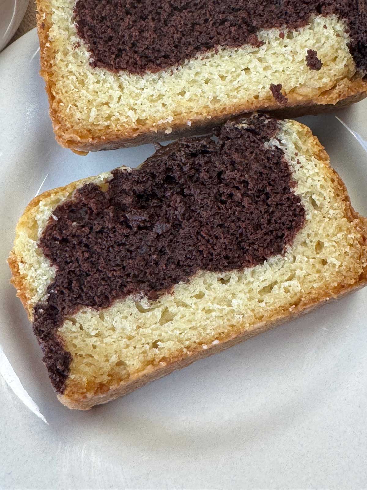 Sliced chocolate and vanilla egg-free cake made with tofu