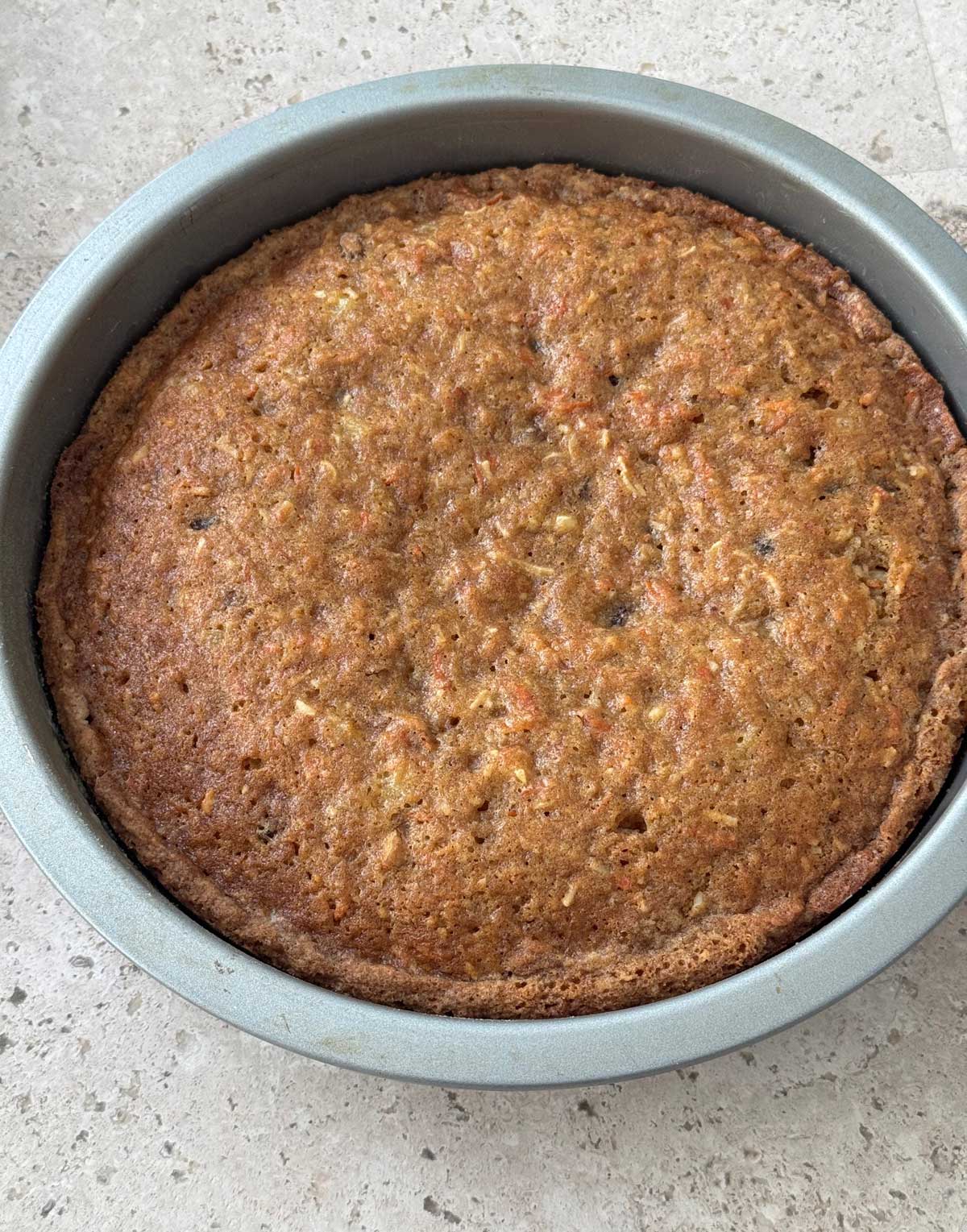 Carrot cake baked in a 9-inch round cake pan.