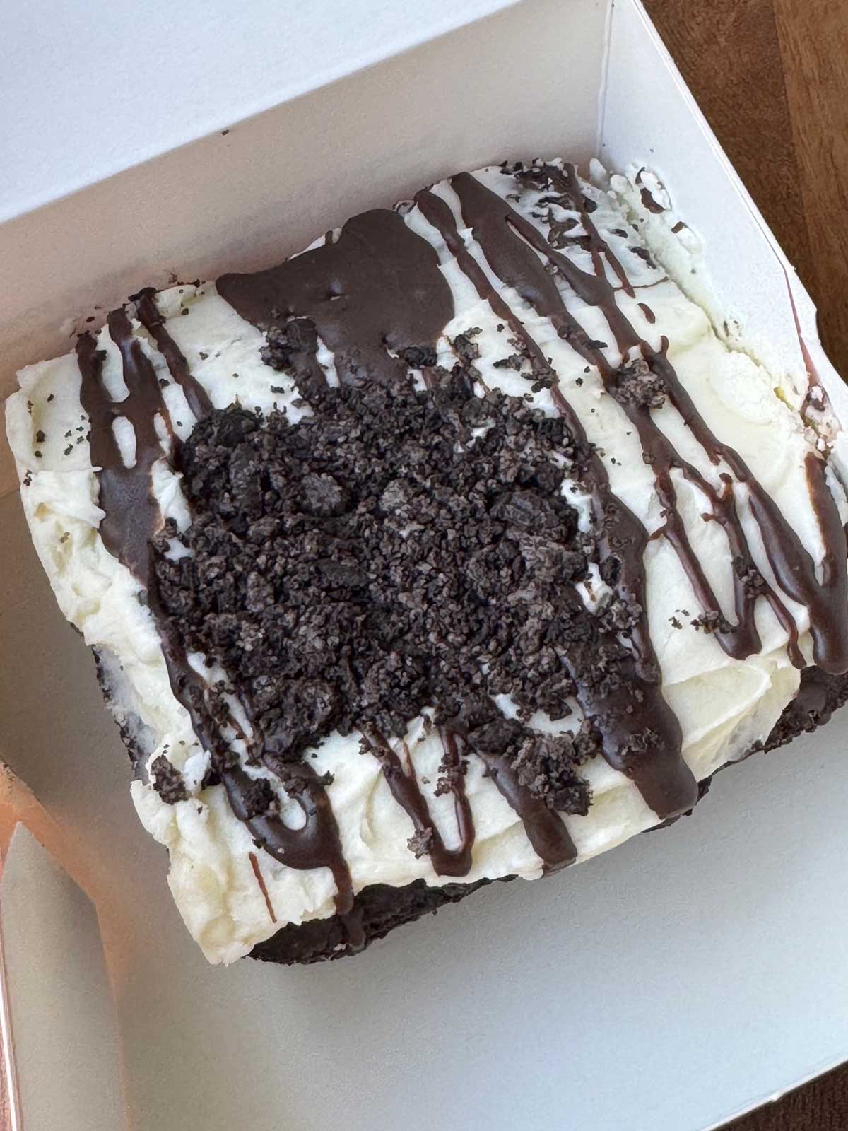 An actual Crumbl Oreo brownie in a box