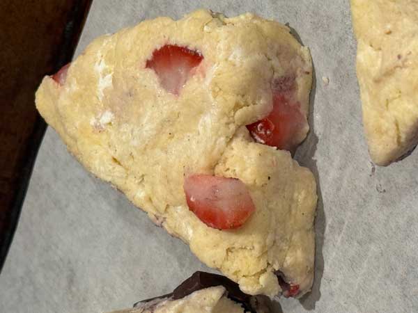 Cut the scone dough into triangles.