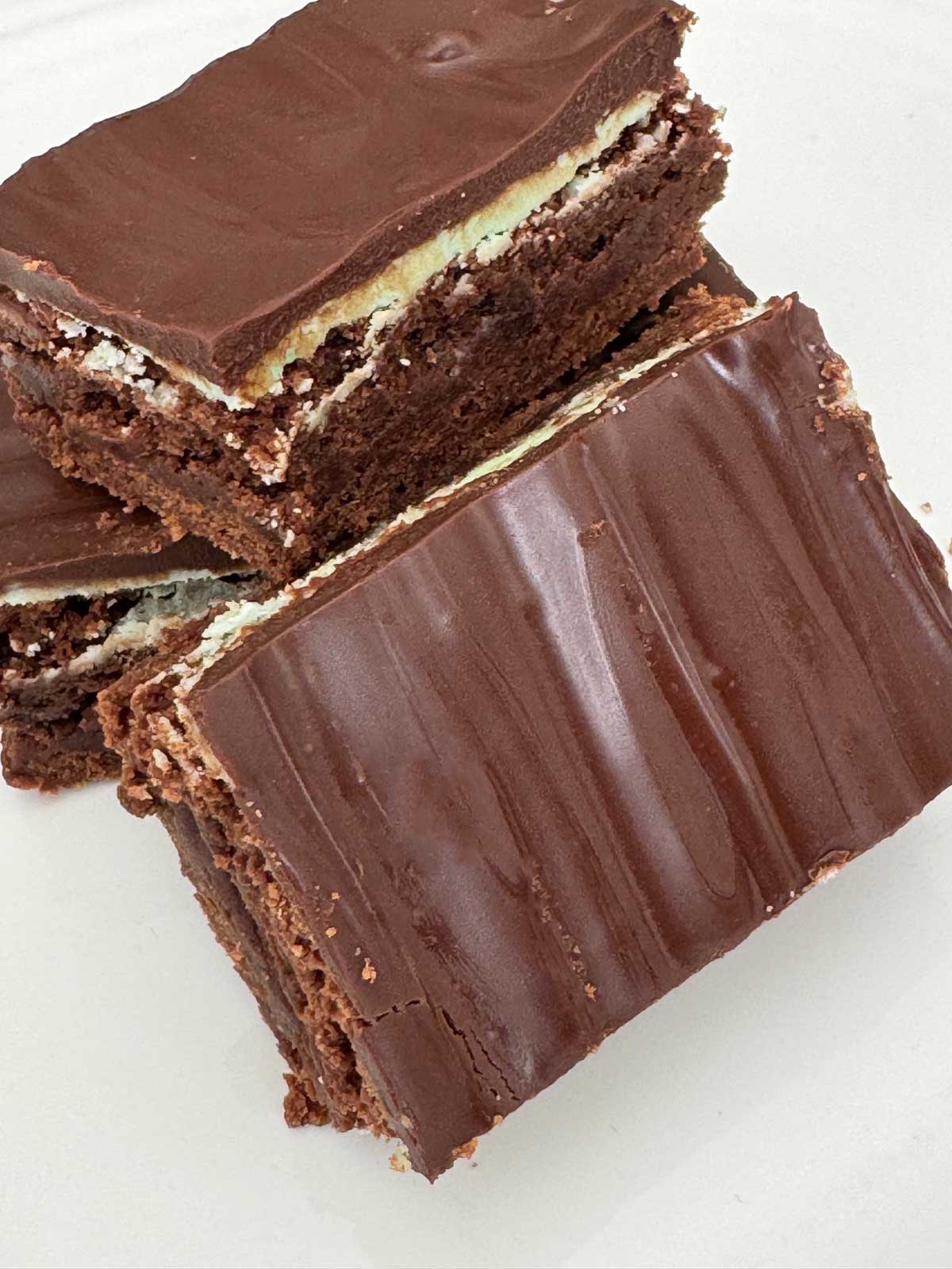 Mint Buttercream Brownies with a shiny chocolate topping